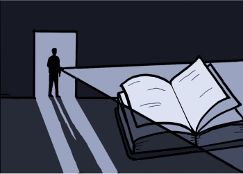 A man stands in a doorway shining a light on a giant open book