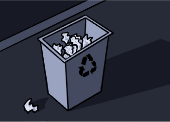 A recycle bin with pieces of paper inside